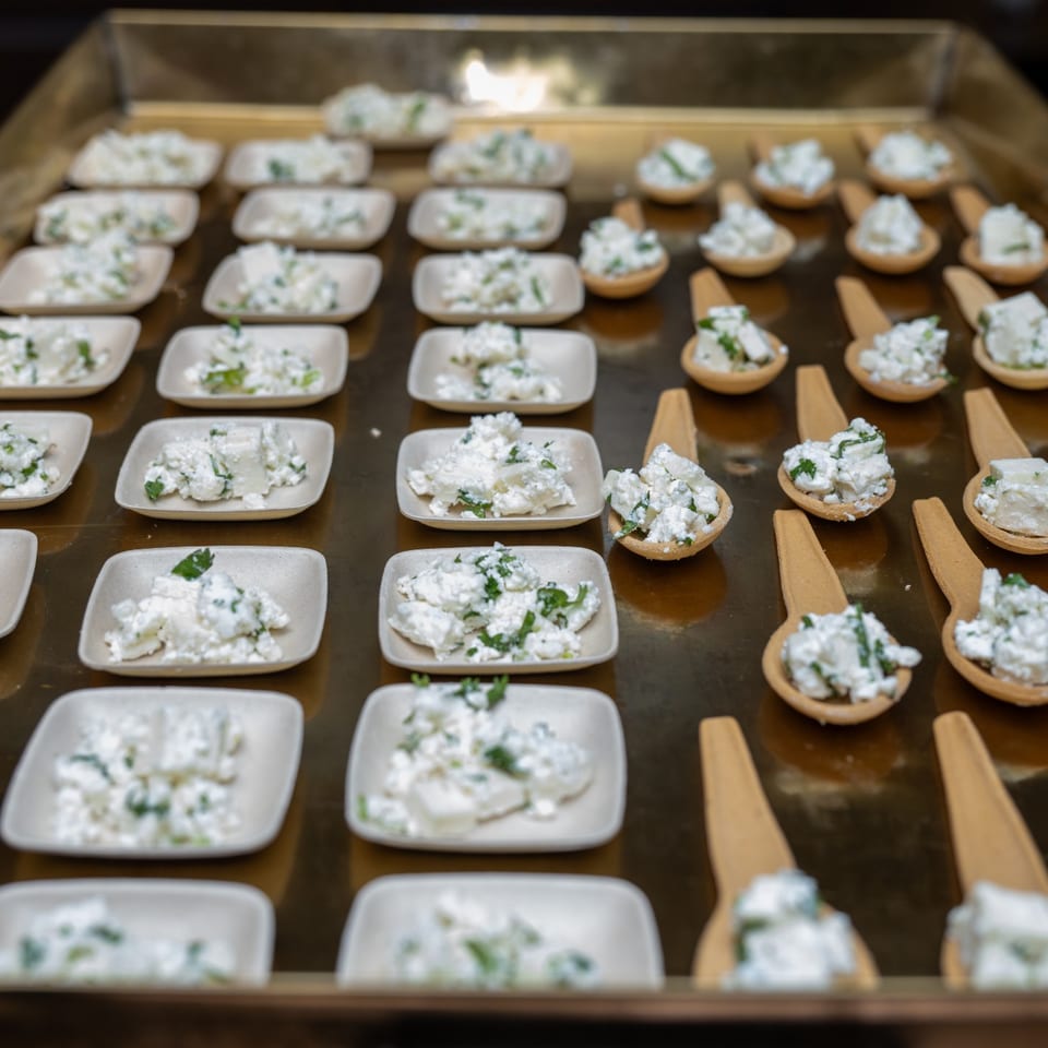 Individual appetizers arranged on a serving tray