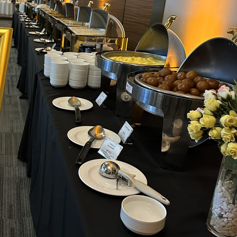 Catering dessert buffet with gulab jamun