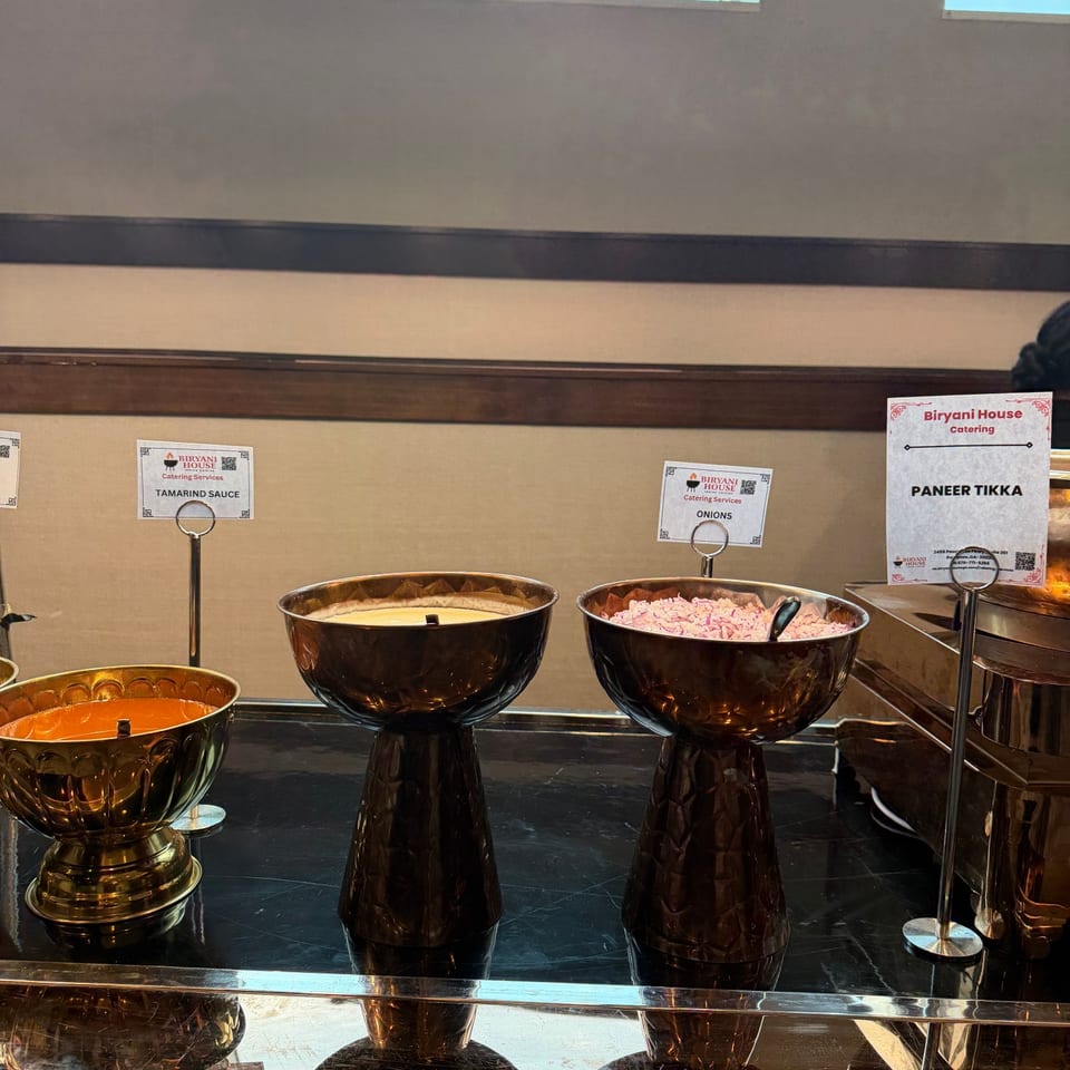 Catering sauces and toppings in gold serving bowls